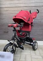 Дитячий велосипед-коляска триколісний TILLY STORM T-349/2 з фарою на кермі та російськими мелодіями/колір зелений