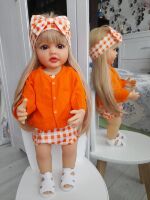 Велика вінілова лялька ручної роботи Reborn Baby Doll зі справжнім волоссям та великими красивими очима. Велика вінілова лялька ручної роботи Reborn Baby Doll зі справжнім волоссям та великими красивими очима.