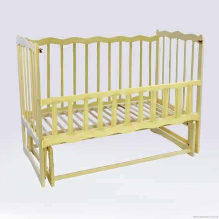 Кроватка деревянная маятник - откидной бортик "Волна" ольха - цвет слонова кость