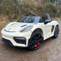 Дитячий одномісний електромобіль Porsche M 6055EBLR-1 шкіряне сидіння 2 мотори білий