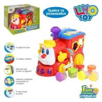 Ігровий паровоз, сортер, піаніно 556